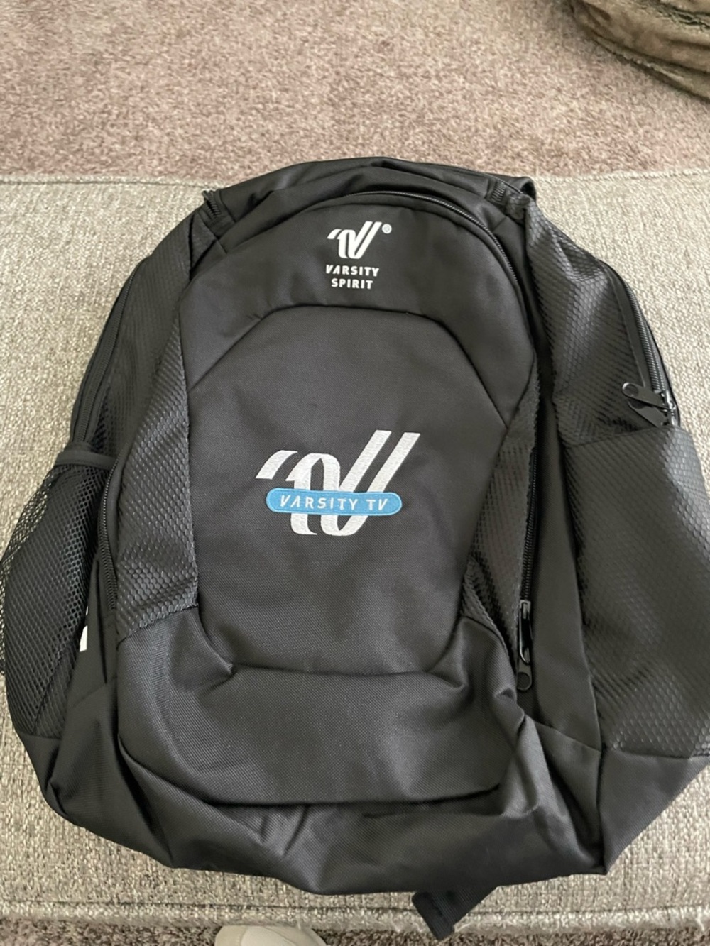 Varsity Black Backpack with Blue Varsity TV Emblem